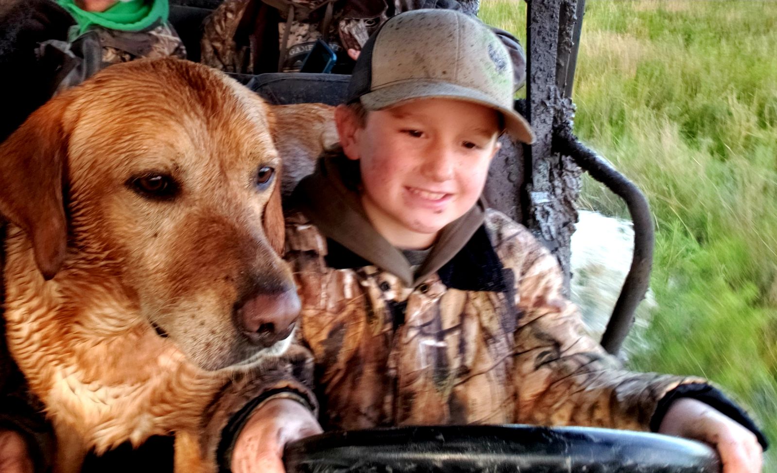 Young hunter with loyal hunting companion